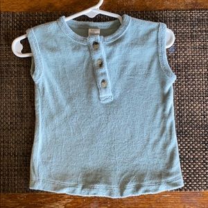 Sleeveless Henley top.